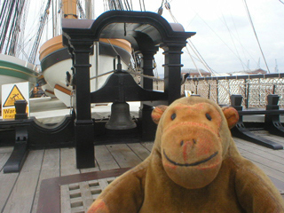 Mr Monkey looking at the ship's bell