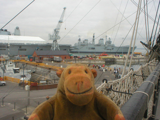 Mr Monkey watching HMS Illustrious leaving the dock
