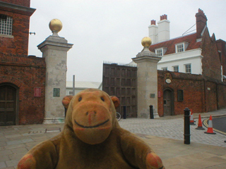 Mr Monkey looking at the main entrance of the Historic Dockyards