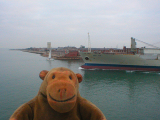 Mr Monkey watching a frieghter leave Portsmouth
