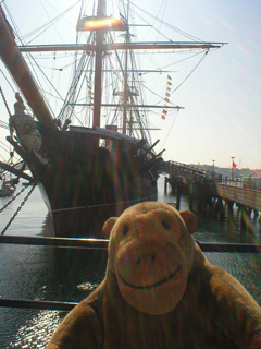 Mr Monkey looking at the prow of HMS Warrior