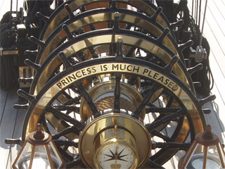 'PRINCESS IS MUCH PLEASED' inscribed on the wheel of HMS Warrior