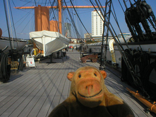 Mr Monkey looking along the deck of HMS Warrior