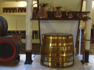 Rum barrels and copper jugs in the rum room