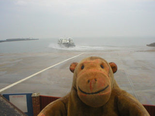 Mr Monkey watching the hovercraft go into the sea at Ryde