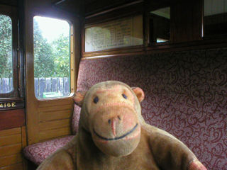 Mr Monkey in a vintage railway carriage
