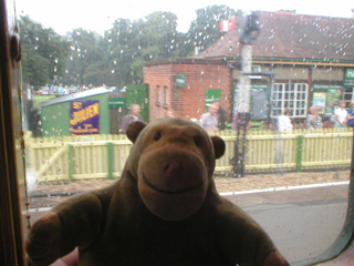 Mr Monkey looking at Havenstreet station
