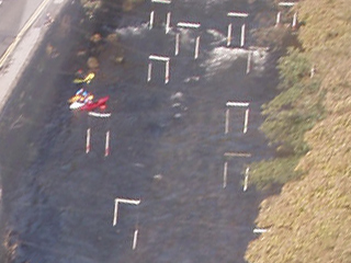 Canoeists and a slalom course in the river