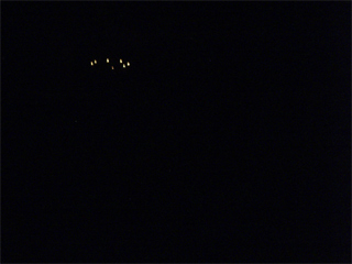 The great cavern illuminated by a single chandelier of candles