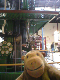 Mr Monkey looking at the side and controls of the Hathorn Davey engine