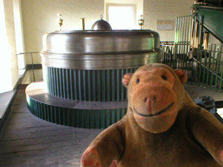 Mr Monkey looking at the top of the Bull engine's cylinder