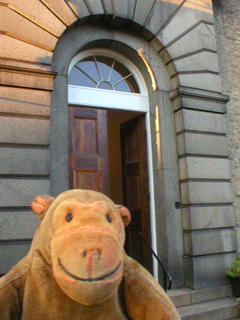 Mr Monkey outside the front door of the main building 
