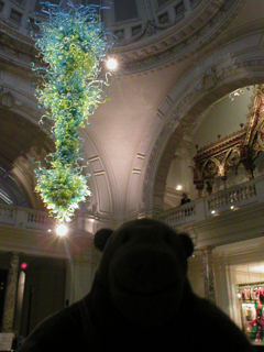 Mr Monkey looking at the Dale Chihuly Chandelier at the V & A