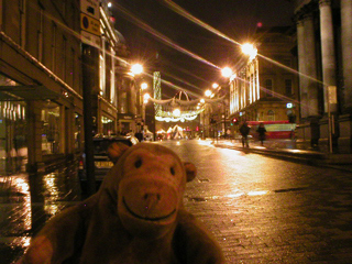 Mr Monkey looking up Grey Street at night