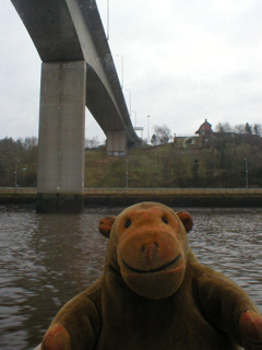 Mr Monkey looking at the Redheugh Bridge from below