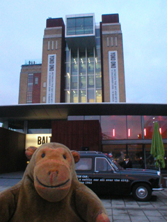 Mr Monkey outside the Baltic at dusk