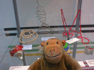 Mr Monkey looking at the Horror Vacui exhibition