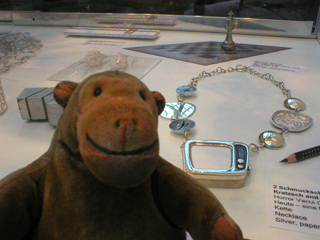 Mr Monkey looking at Horror Vacui exhibits