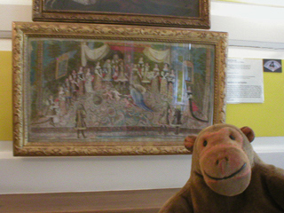 Mr Monkey looking at a fan converted into a painting