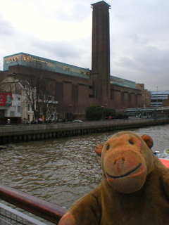 Mr Monkey looking at Tate Modern from Bankside pier
