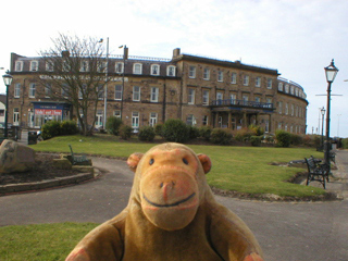 Mr Monkey looking at the North Euston Hotel