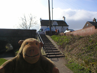 Mr Monkey looking at the Bull's Head at High Lane