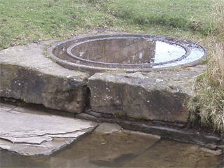 The base of the non-existent swing bridge