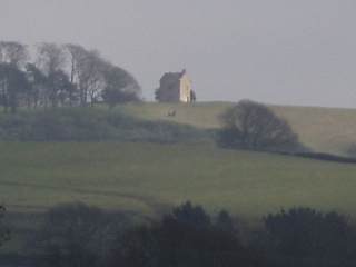 Paddock Cottage at Lyme Park seen from the Macclesfield Canal