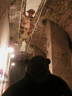 Mr Monkey looking up at the roof of the Shunt lounge