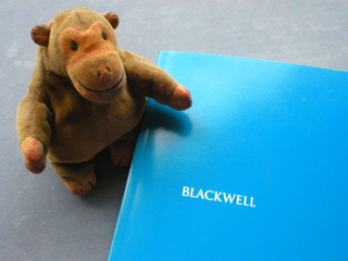 Mr Monkey with his new book