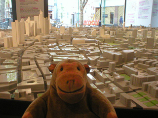 Mr Monkey looking at the scale model of London