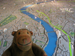 Mr Monkey looking at the model of London from the west