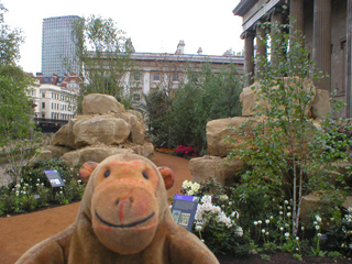 Mr Monkey looking at India Landscape outside the British Museum