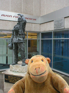 Mr Monkey looking at the fireman's memorial