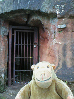 Mr Monkey looking at an entrance to the Redcliffe cave system