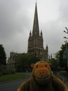 Mr Monkey looking at St Mary's from across the road