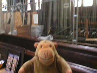 Mr Monkey looking at the dismantled organ