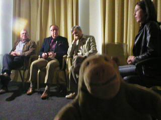 Mr Monkey watching Meg Gardiner answering questions