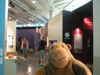 Mr Monkey walking through the Videogame Nation exhibition