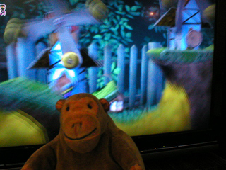 Mr Monkey watching LittleBigPlanet