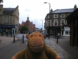 Mr Monkey looking at the Harrogate Grand Opera House