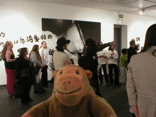 Mr Monkey listening to Birdhead talking about their exhibition