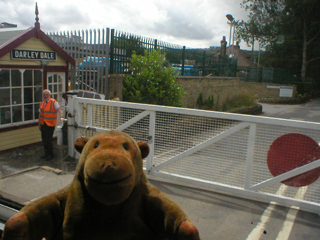 Mr Monkey looking at the Darley Dale level crossing