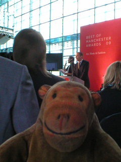 Mr Monkey listening to Vaughan Allen's speech