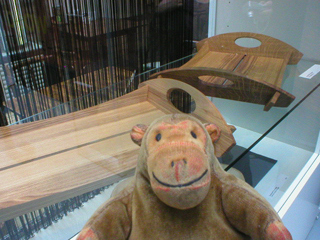 Mr Monkey looking at trays by Howcroft and Jordan