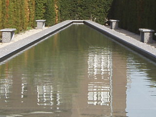 A long, tapering pool of water