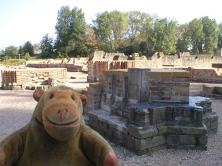 Mr Monkey in front of the ruins of the church porch