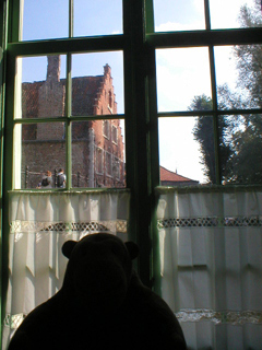Mr Monkey looking out of the parlour window