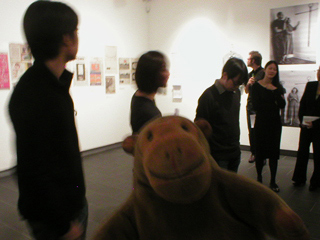 Mr Monkey listening to the exhibition being introduced