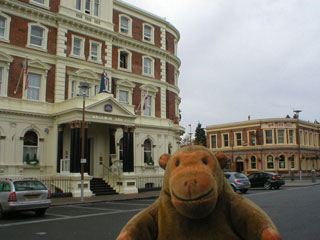 Mr Monkey looking at the Queen Hotel